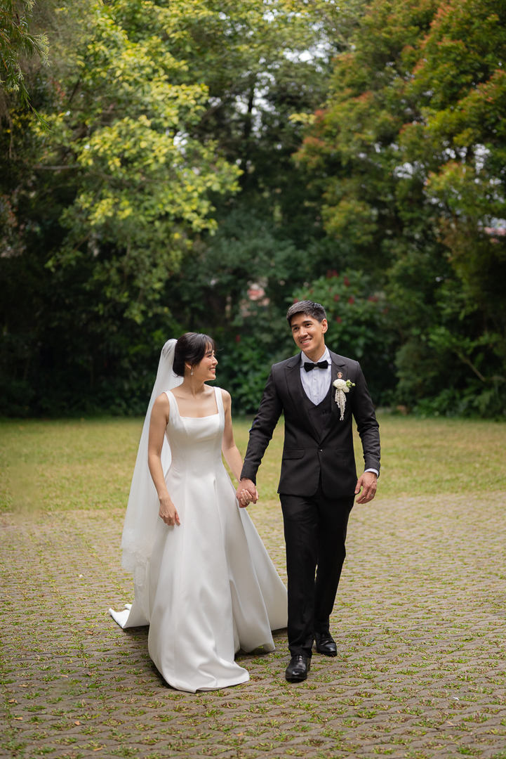 A couple walking at Frangeli House Garden Wedding